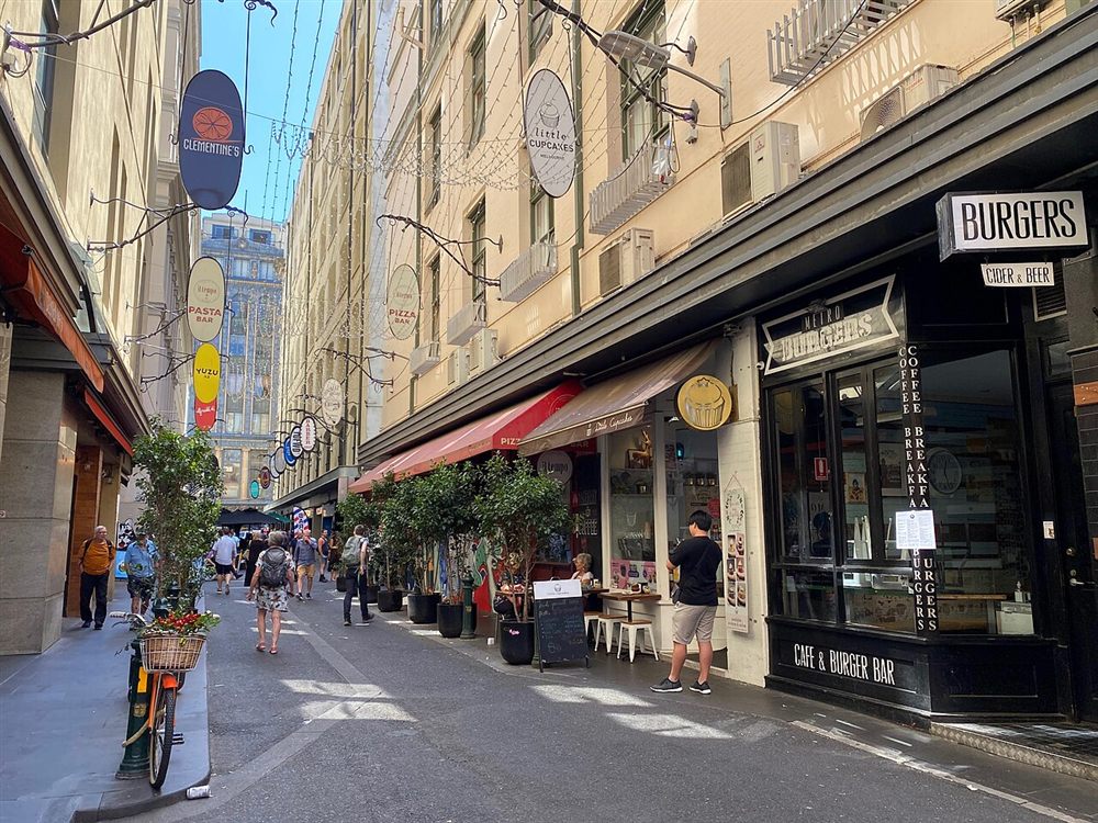 Degraves Street lined with cafés and outdoor tables