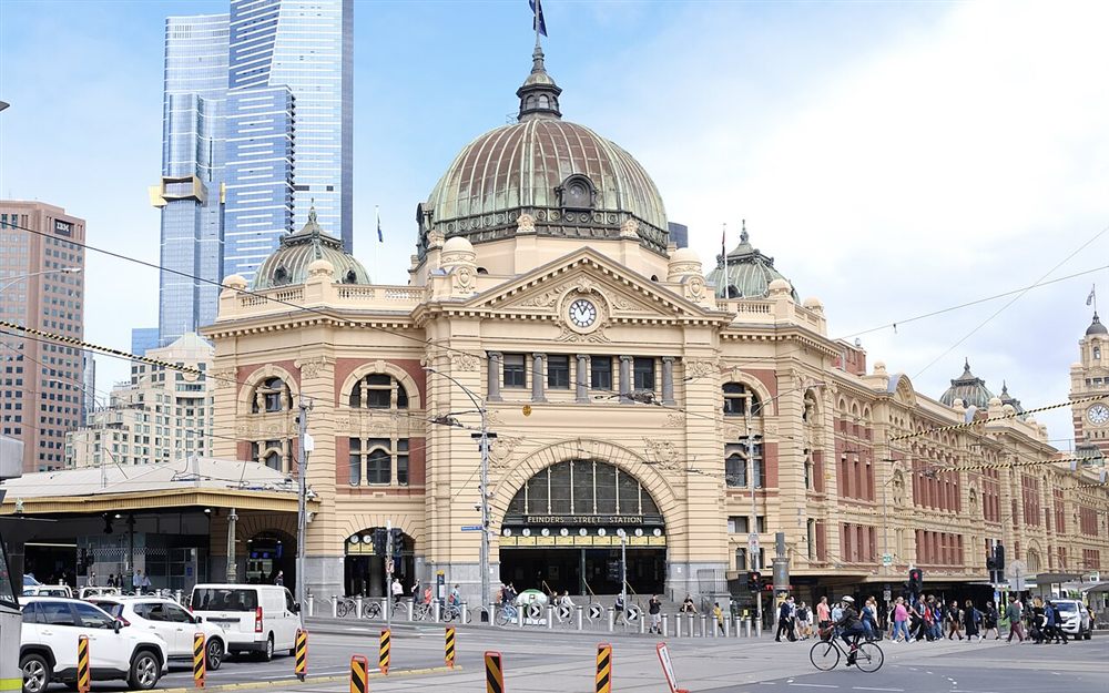The yellow-domed Flinders Street Station building on a sunny day