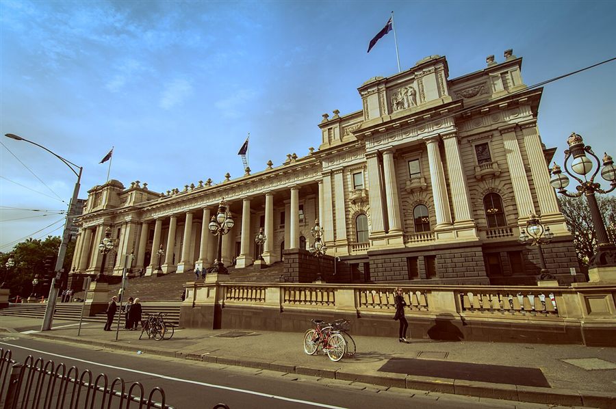The columned front of Parliament House on Spring Street