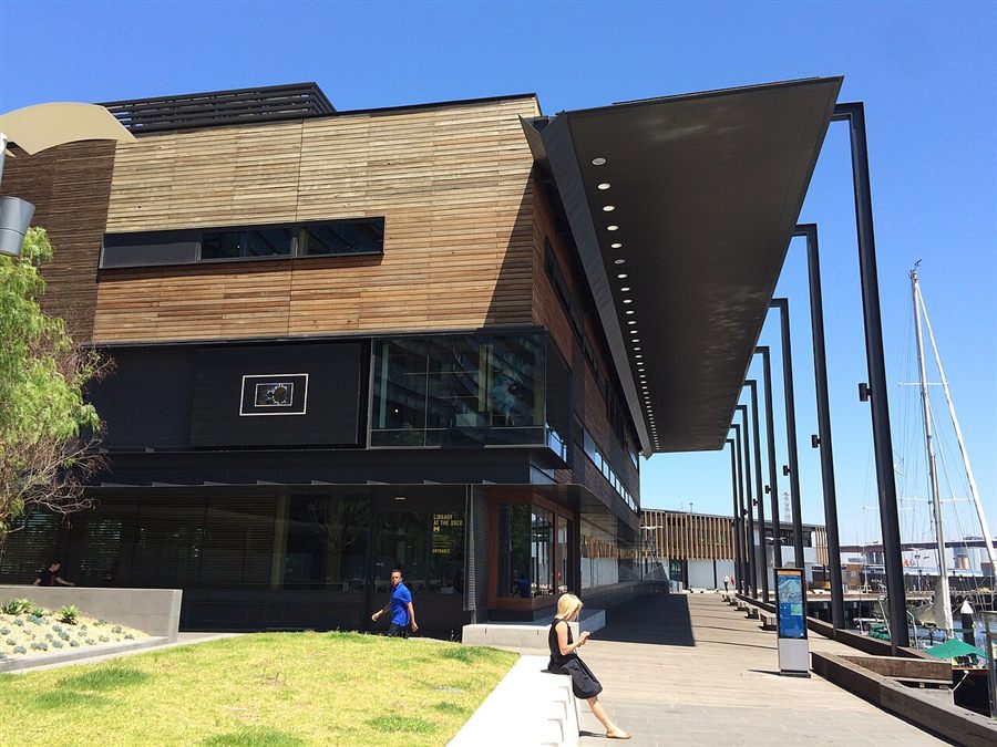 The timber-clad Library at the Dock beside the harbour promenade