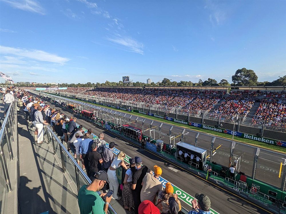 Crowds and grandstands along the main straight of the Albert Park circuit
