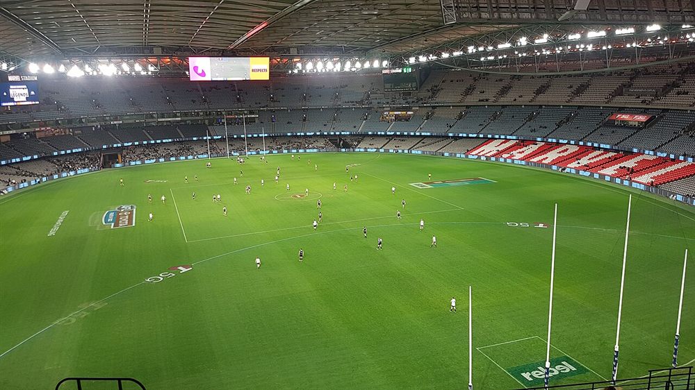 Inside Marvel Stadium under the lights during an AFL match
