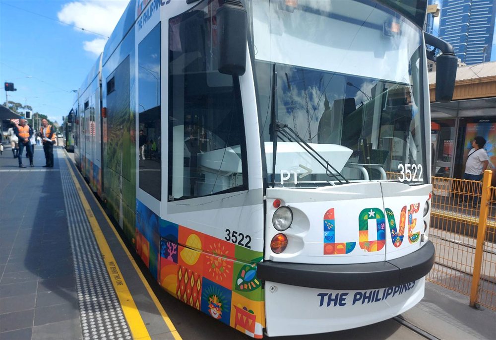 Tram 3522 at a city stop, with LOVE on its front and THE PHILIPPINES along the bottom