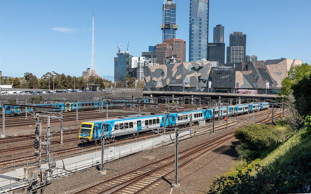 Blue sky over the city rail yards, Federation Square and Southbank towers